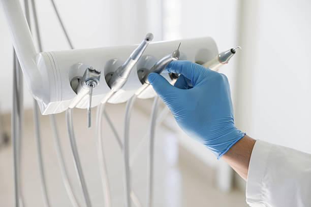 Professional Teeth Whitening technician working in West Hills, NY